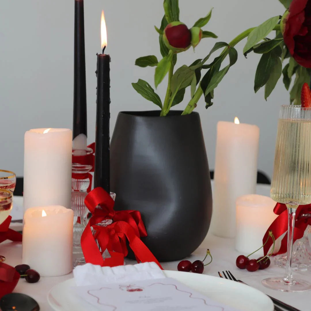 vases with roses and candles